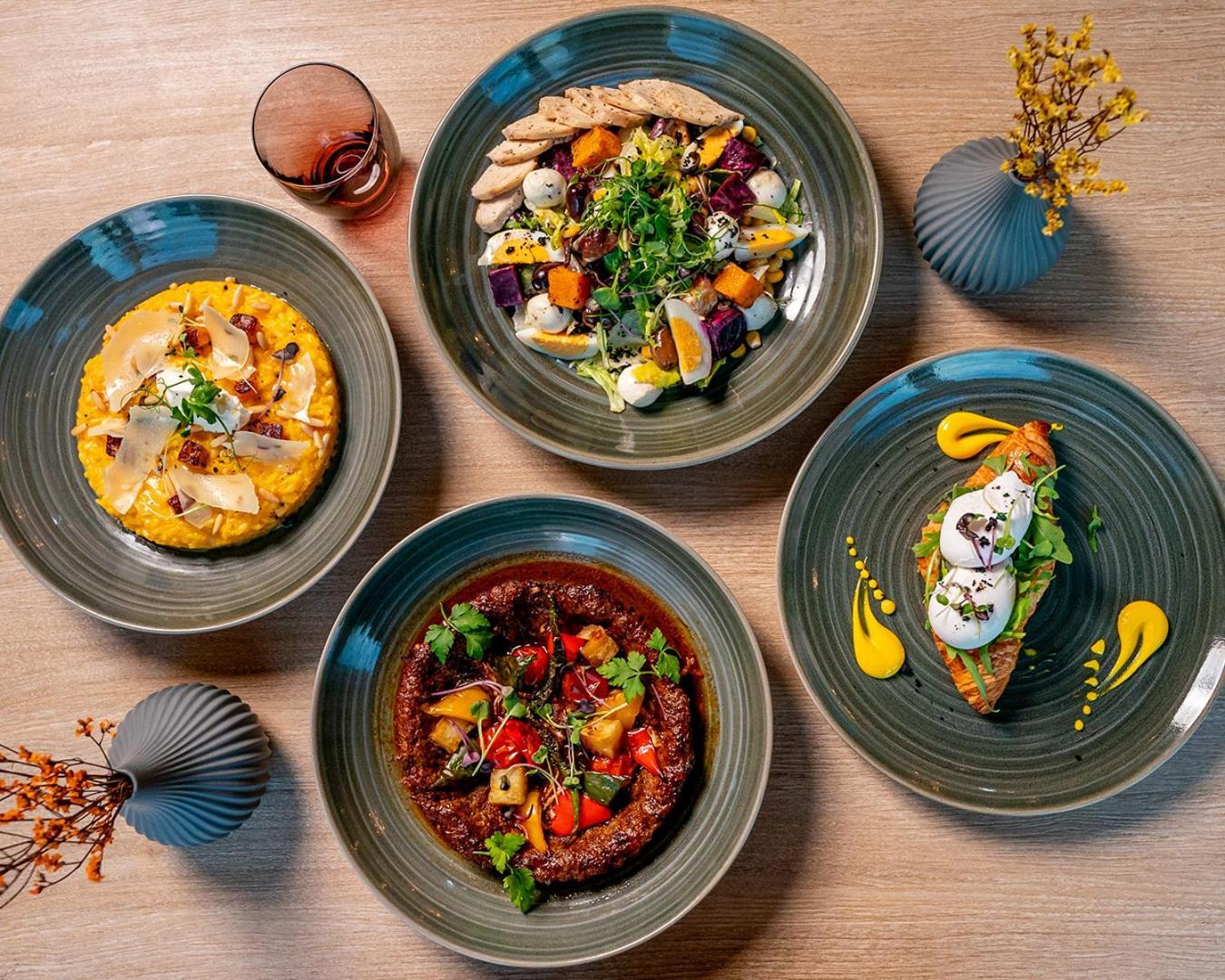 Doubletree By Hilton Fujairah City Bagian luar foto Dishes at the restaurant